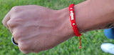 "Ambitions" Red Handmade St. Jude Braided Bracelet