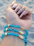 "Peaceful" Handmade Aqua Virgin Mary Beaded Bracelet